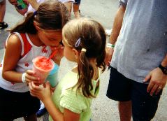Katlyn & Emily sharing slushies